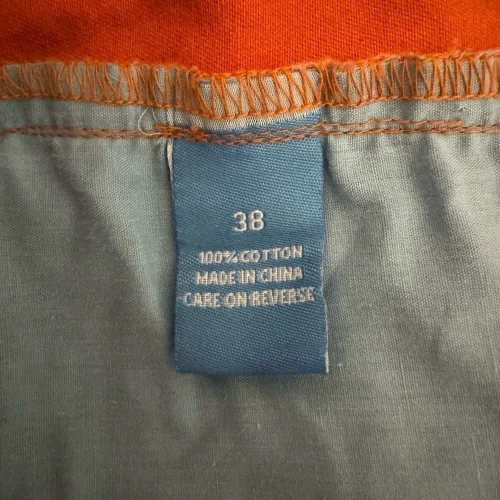 COAST PAWLEYS TWILL SHORTS 38. 7” inseam. Flat front chino rust orange